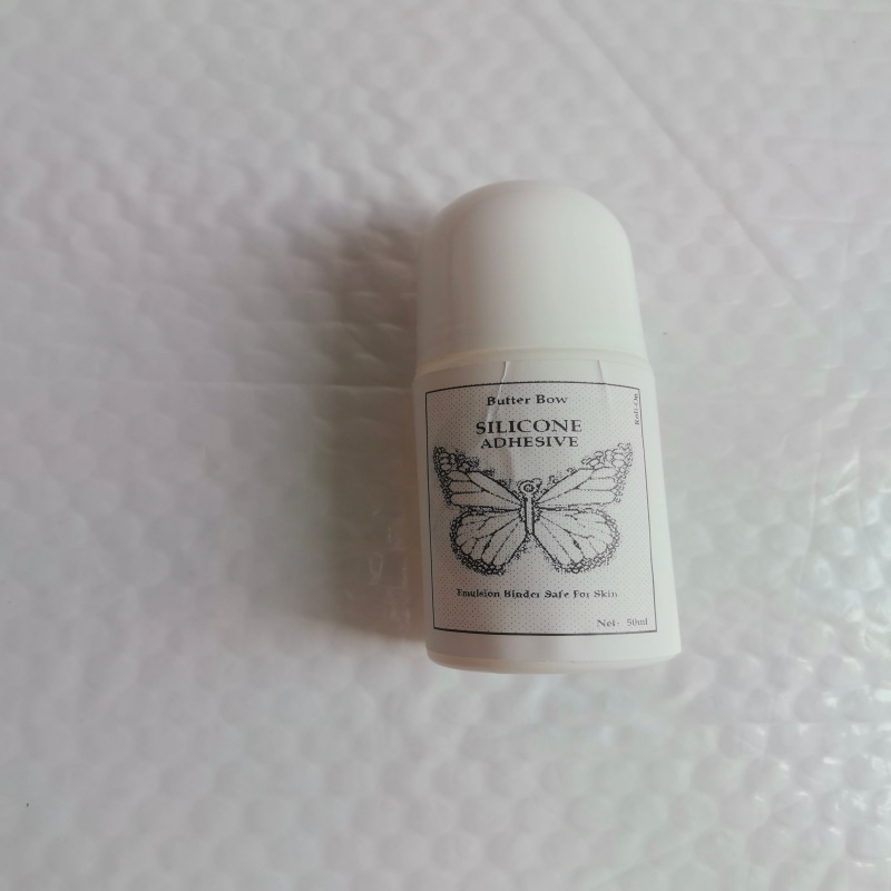 CD Silicone Adhesive Roll-On E - огляд і ціна Strapless Bra Adhesive